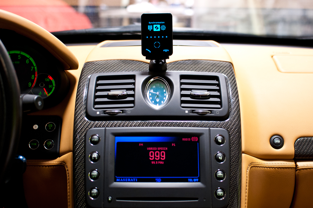 Bury device adds bluetooth hands free calling and wireless audio streaming. Installed in such a way no wires are visible and no modification to the vehicle.
